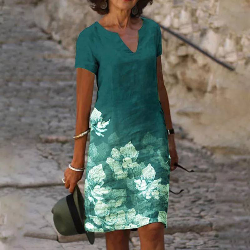 Stylish women's summer dress with vibrant floral print and comfortable loose fit
