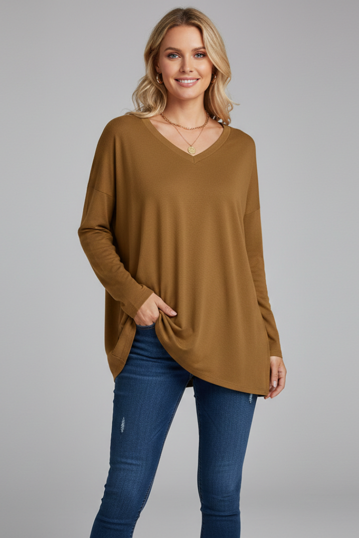 Stylish women's pull-on V-neck top with long sleeves, offering comfortable and versatile fashion.