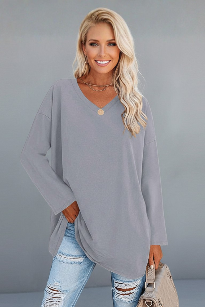 Effortlessly stylish V-neck long sleeve women's top, relaxed fit, great for casual comfort.