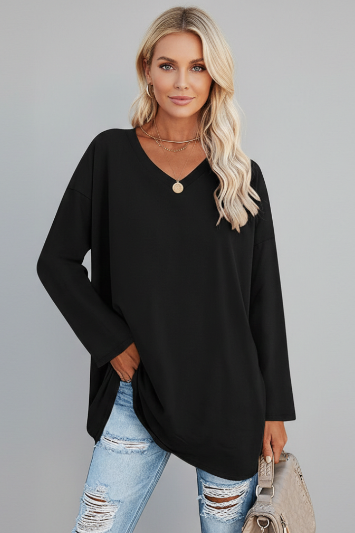 Casual women's pull-on V-neck top with long sleeves, offering a comfortable, versatile look.
