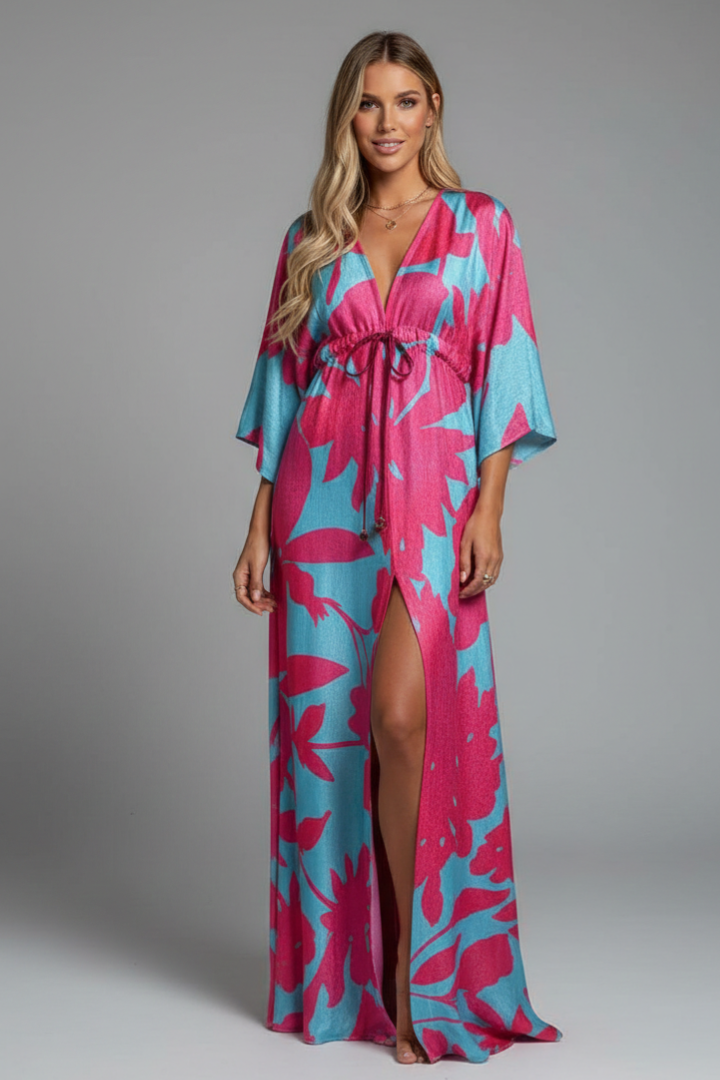 Elegant V-neck maxi dress for women with tie waist, printed design, ideal for summer vacation.