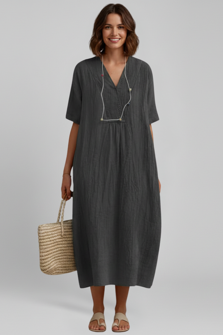 Elegant women's V-neck day dress, knee-length, featuring chic ruffled sleeves and a comfortable design.