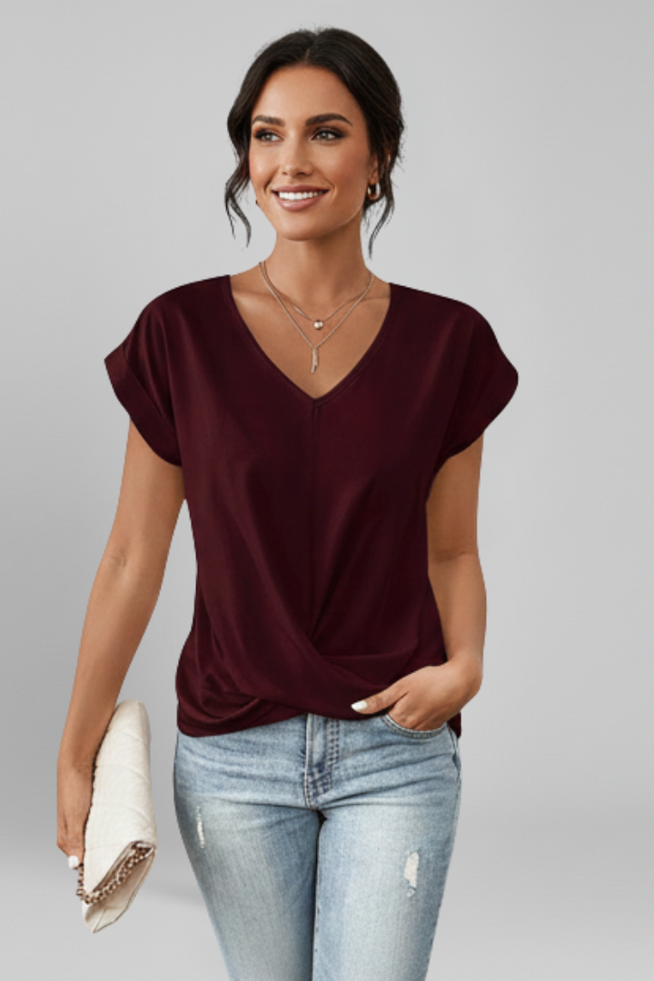 Versatile & chic women's V-neck short sleeve blouse, great for casual or elegant looks.