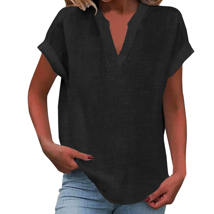 Elegant V-neck women's blouse with short sleeves, designed for breathable comfort and chic spring style.