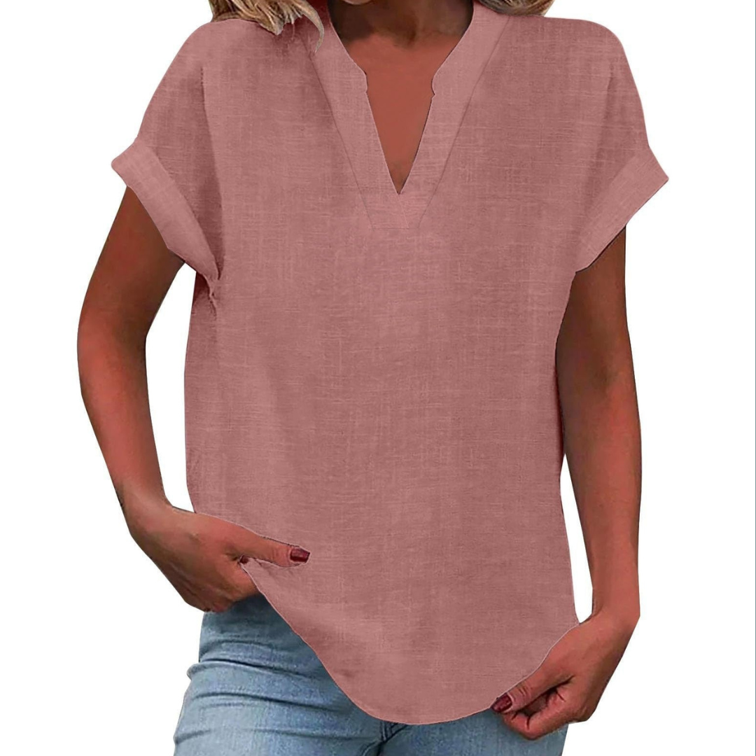 Relaxed fit women's V-neck blouse with short sleeves, offering comfortable and effortless style for daily wear.