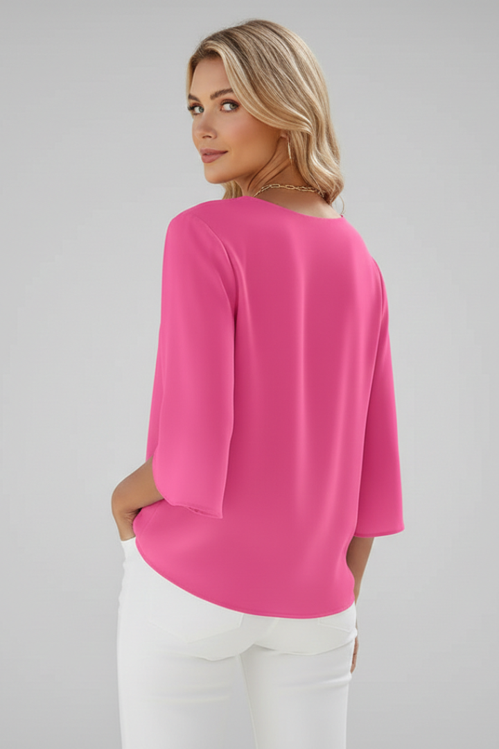 Relaxed fit women's V-neck short sleeve pull-on blouse, comfortable for casual wear & everyday style.