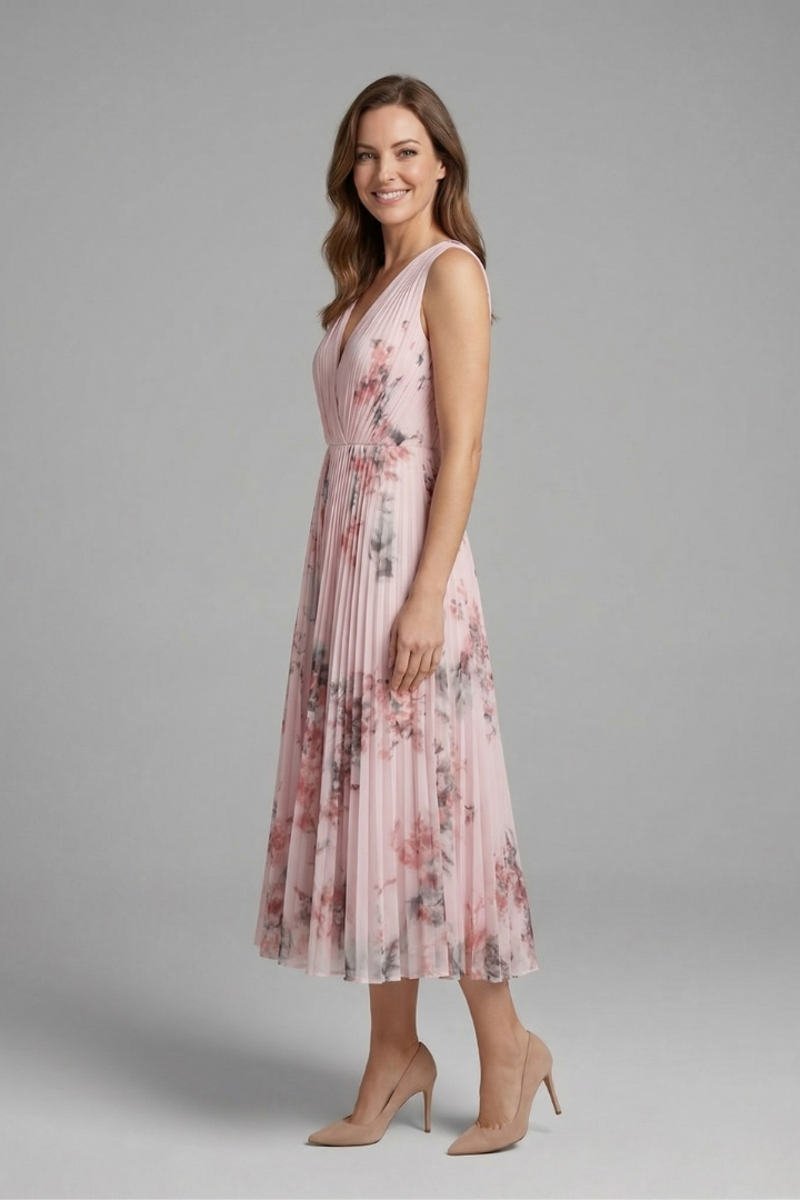 Elegant V-neck pleated midi dress for women, a comfortable A-line summer fashion statement.