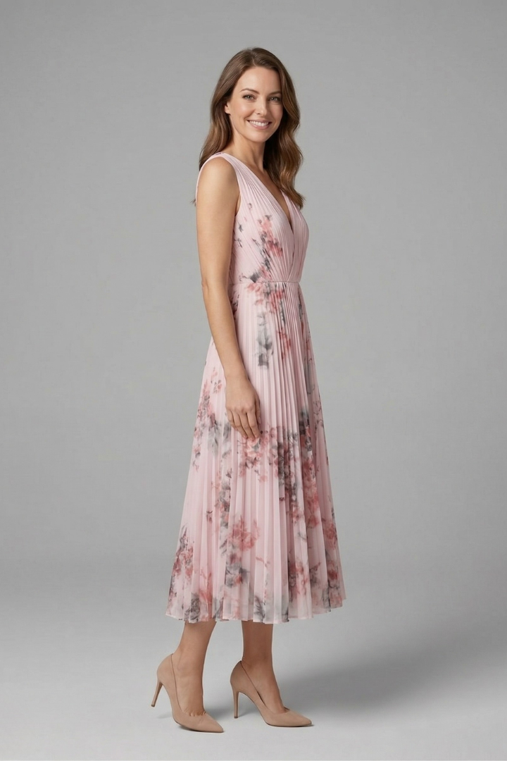 Casual women's V-neck sleeveless midi dress, featuring a flattering pleated design for spring.