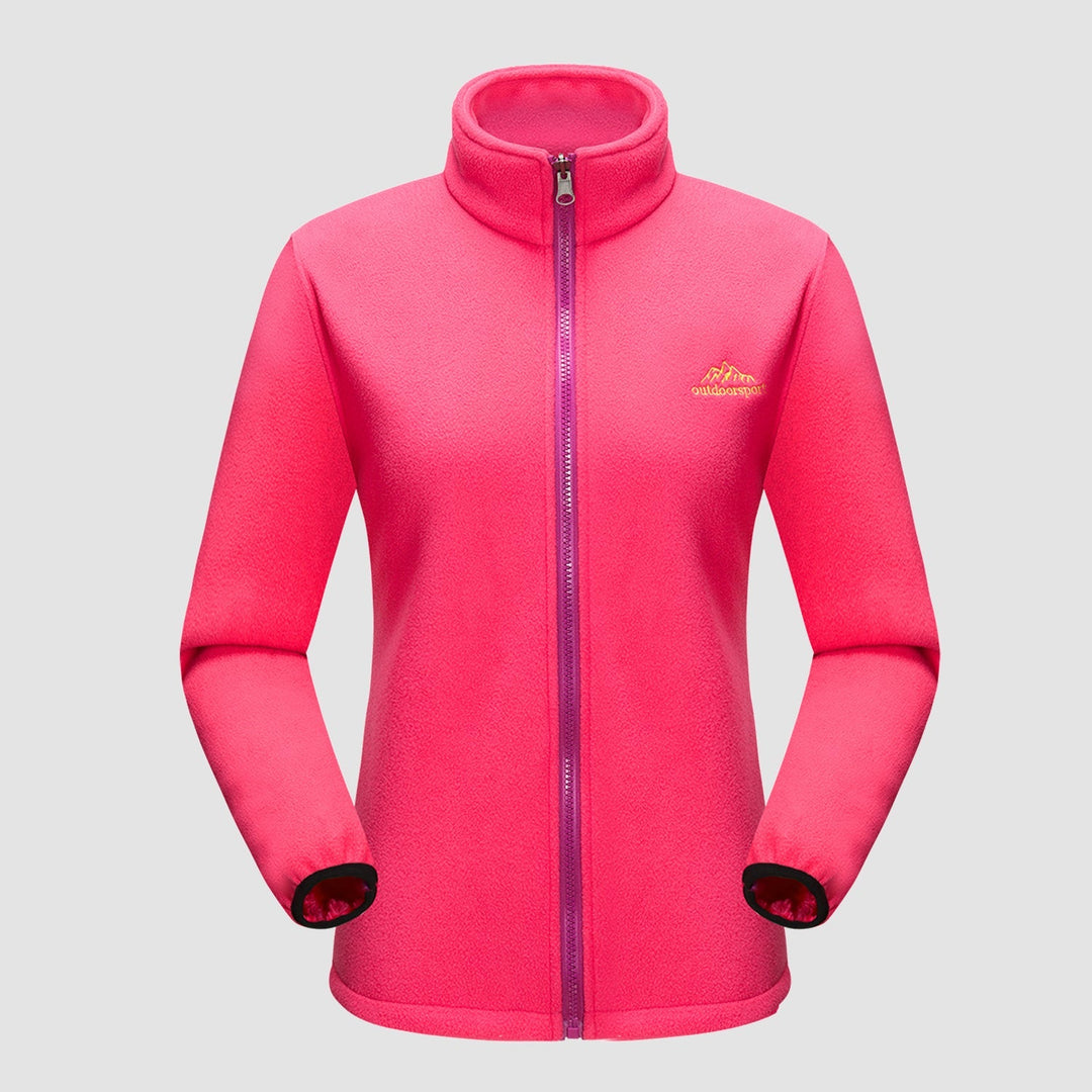 Stylish woman in a Verona 3-in-1 waterproof jacket, looking confident and protected from the elements.