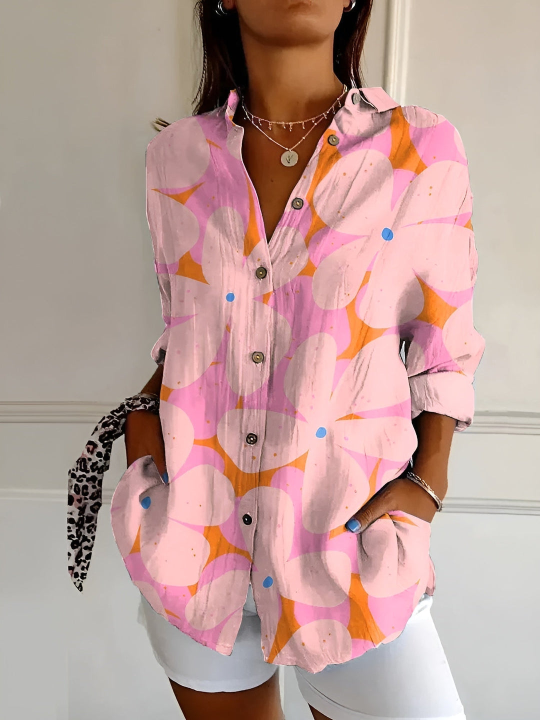 Comfortable women's plus size abstract print blouse, split neck, long sleeves.