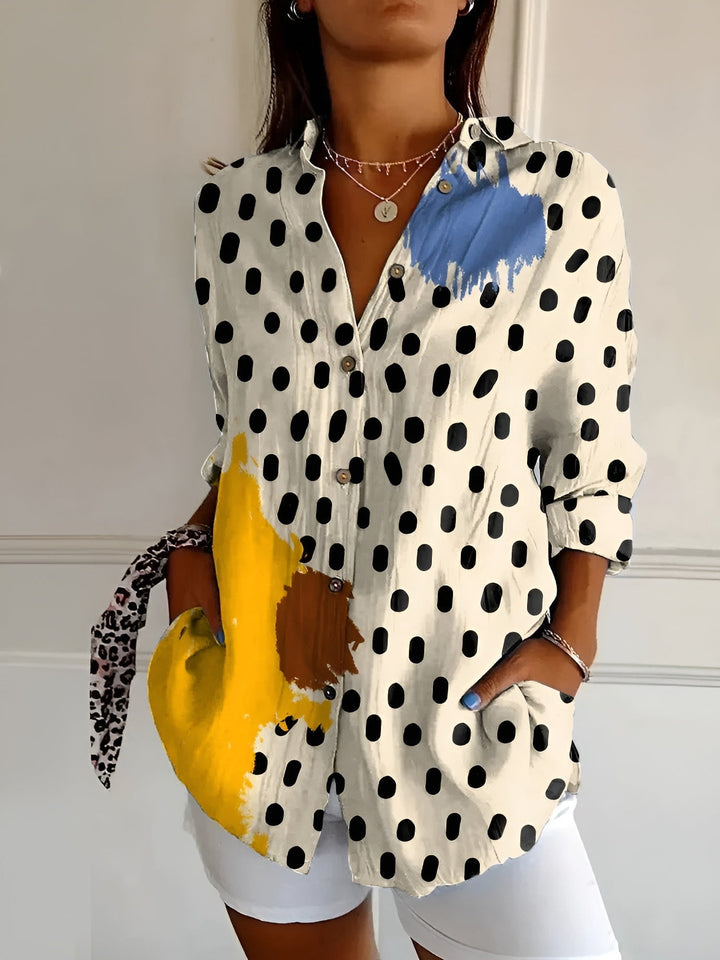 Stylish women's button front blouse, abstract print, split neck, long sleeve comfort.