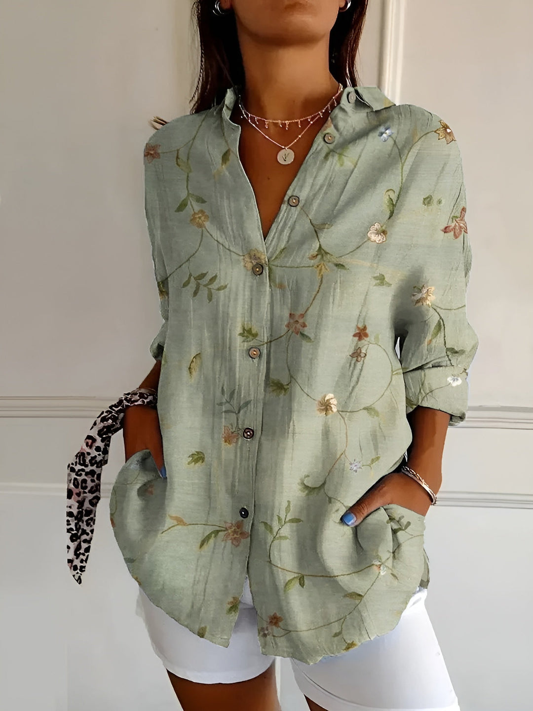 Plus size women's abstract print blouse, comfortable split neck long sleeve top.