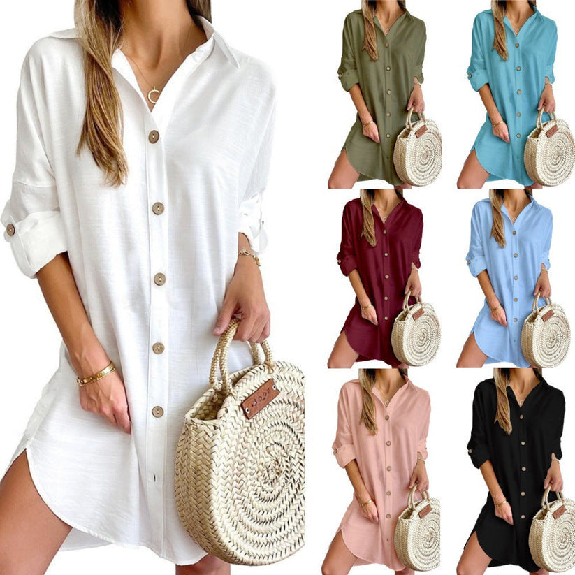 Women's button-up shirt dress featuring a relaxed fit and stylish roll-up sleeves.