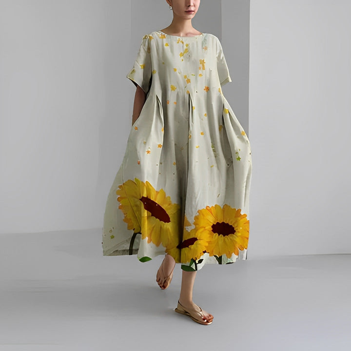 Stylish women's vibrant floral maxi dress, a comfortable vacation statement piece for summer.