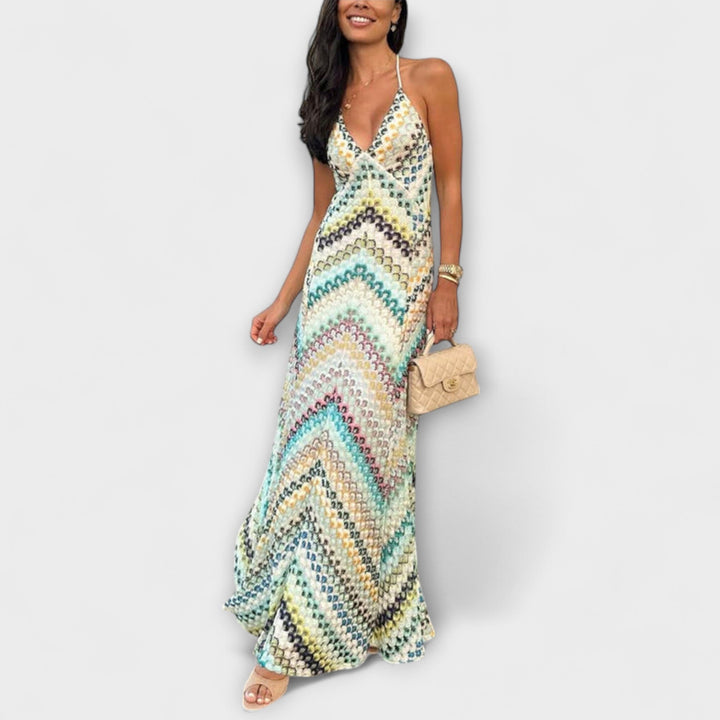 Women's vibrant herringbone pattern maxi dress, v-neck, ankle-length, elegant vacation & evening wear.