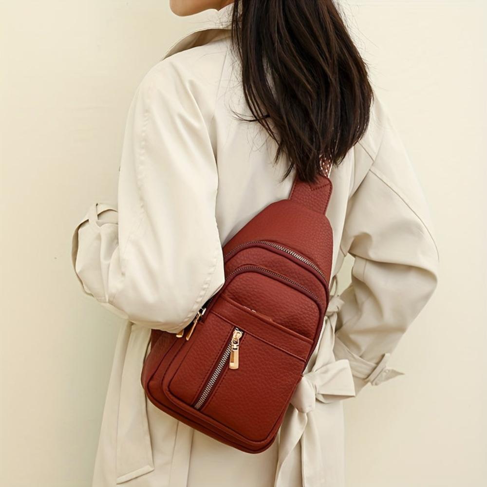 Durable women's vintage leather shoulder bag, ideal for daily essentials and urban wear.