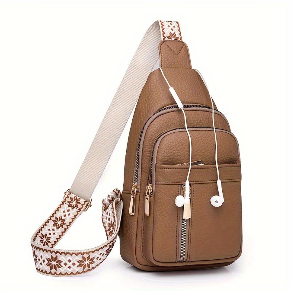 Fashionable women's chest bag with adjustable strap, classic vintage leather look.