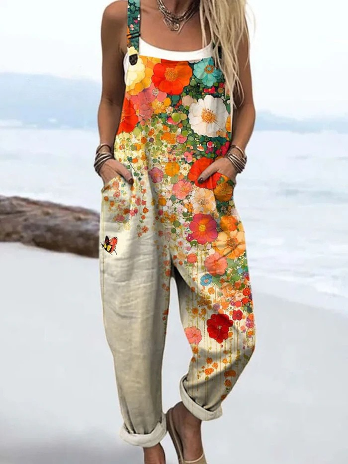 Women's vintage floral wide-leg jumpsuit, perfect for summer casual wear or vacation. Effortless patterned style.