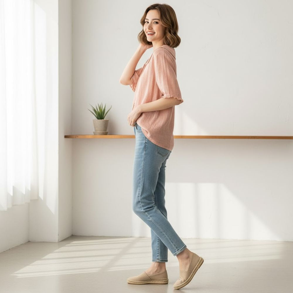 Feminine women's blouse featuring a unique scalloped collar & classic button-down front, perfect for elegant fashion.