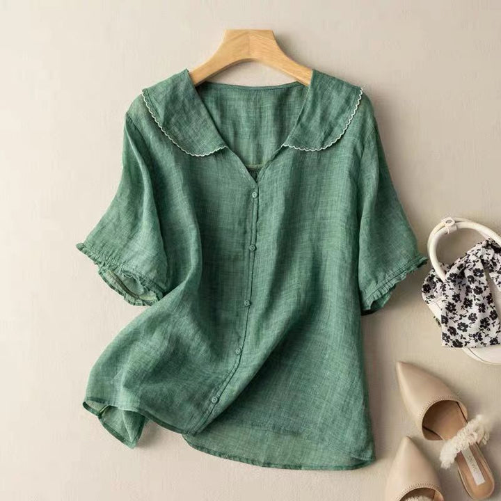 Comfortable vintage-style long-sleeve blouse for women, with a charming scalloped collar, versatile for any wardrobe.