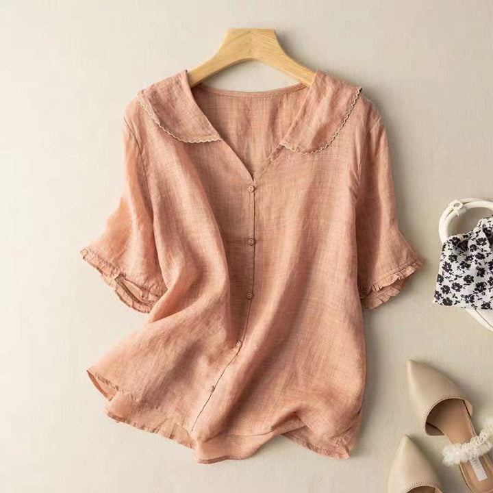 Stylish women's vintage blouse with a distinctive scalloped collar. A comfortable button-down top for office or casual wear.