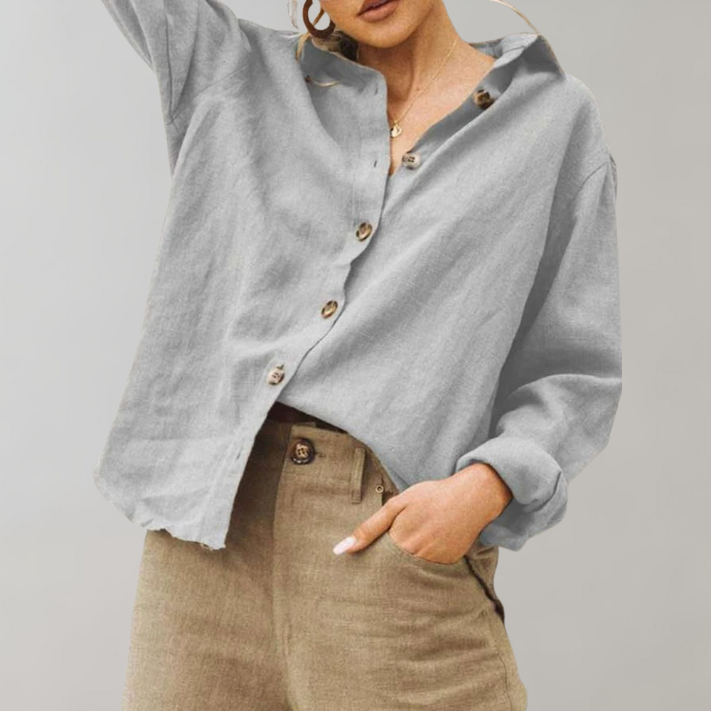 Elegant women's vintage style button-down blouse. Versatile long sleeve top for casual chic or modest everyday wear.
