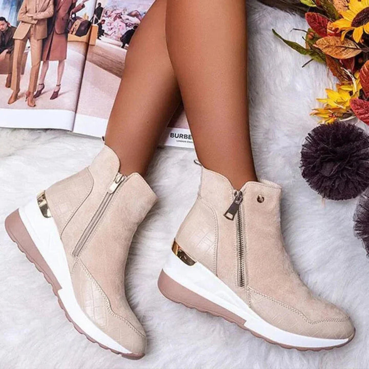 Stylish women's waterproof ankle boots in brown. Comfortable and durable for everyday casual wear & outdoor fashion.