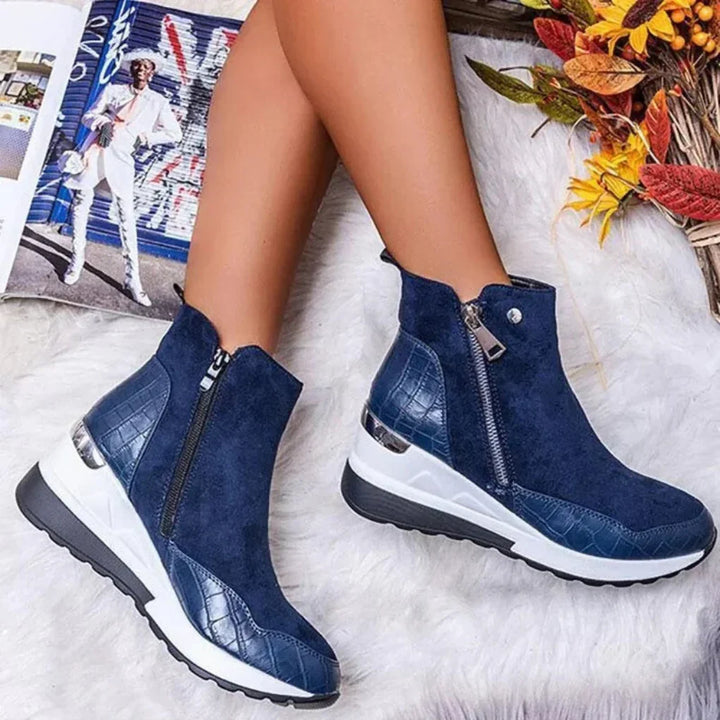 Fashionable women's waterproof black ankle boots. Enjoy comfortable & dry feet with these versatile all-weather boots.