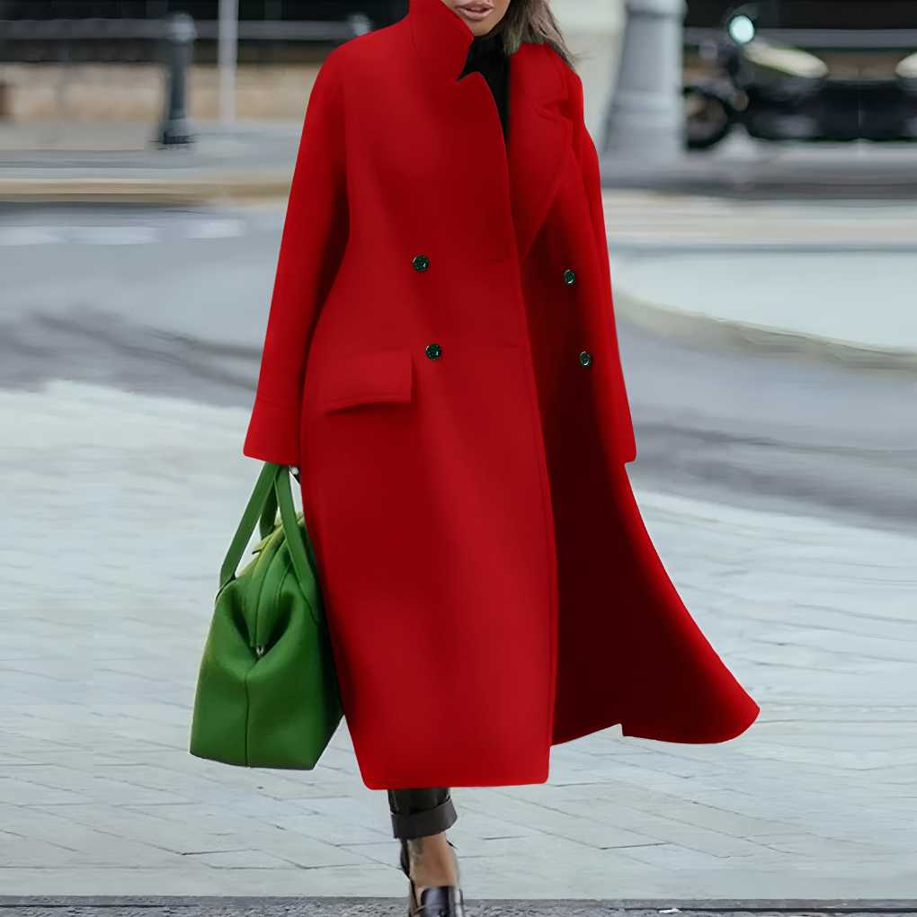 Women's waterproof long coat with button closure, perfect for weather protection.
