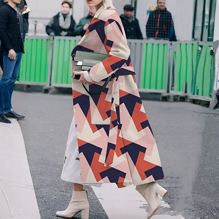 Stylish women's button-front waterproof long coat, versatile outerwear for unpredictable weather.