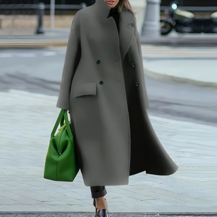 Elegant women's waterproof long jacket with secure button closure, ideal for stylish outerwear.