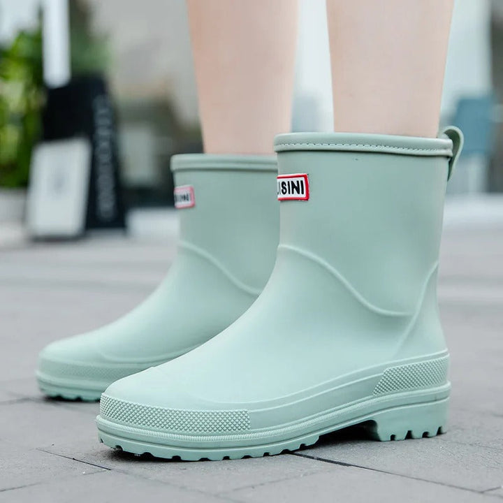 Women's waterproof slip-on ankle rain boots. Perfect for rainy days & wet weather.