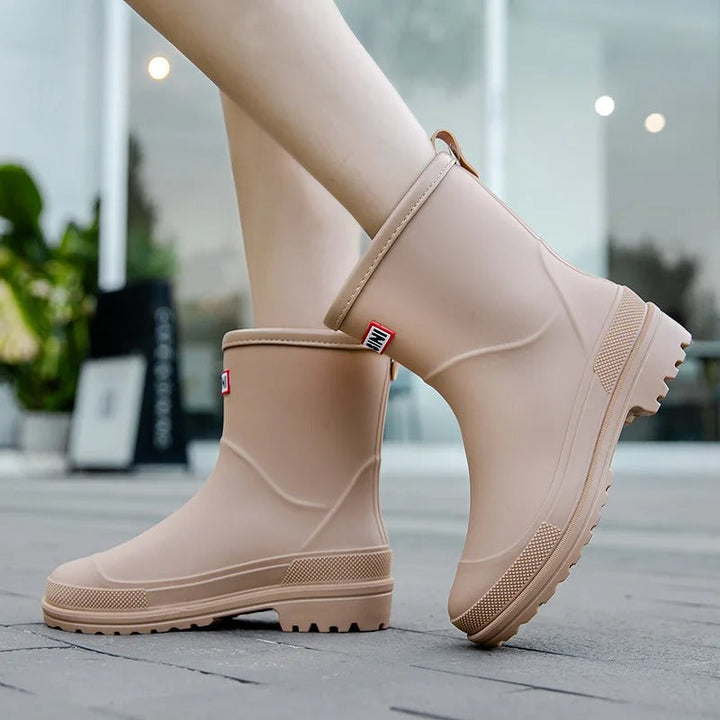 Stylish women's waterproof ankle boots. Slip-on design for easy wear in rain.