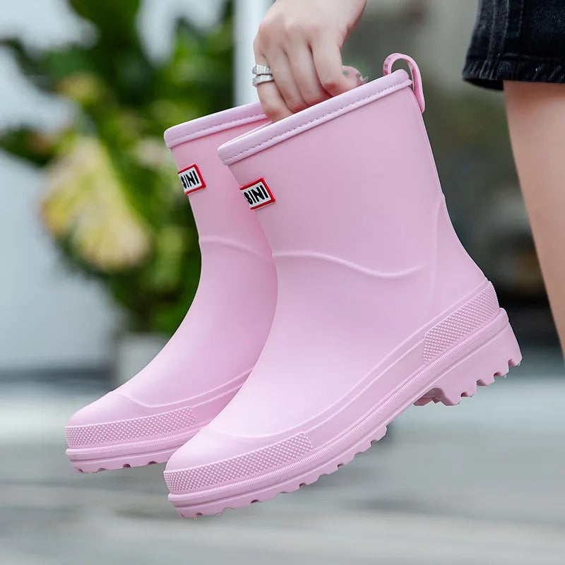 Fashionable women's rain boots. Waterproof slip-on ankle boots for stylish rainy days.