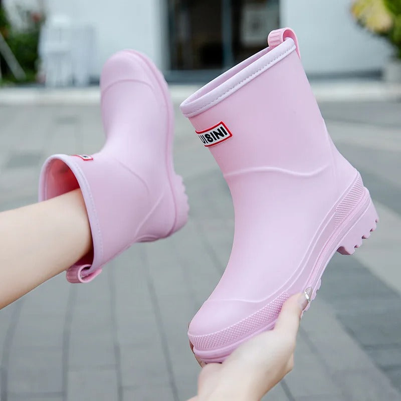 Practical women's waterproof ankle boots. Slip-on style, ideal for rainy days & outdoor comfort.