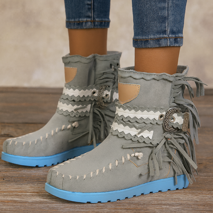 Fashionable women's ankle boots with western-style fringe, ideal for comfortable daily wear.