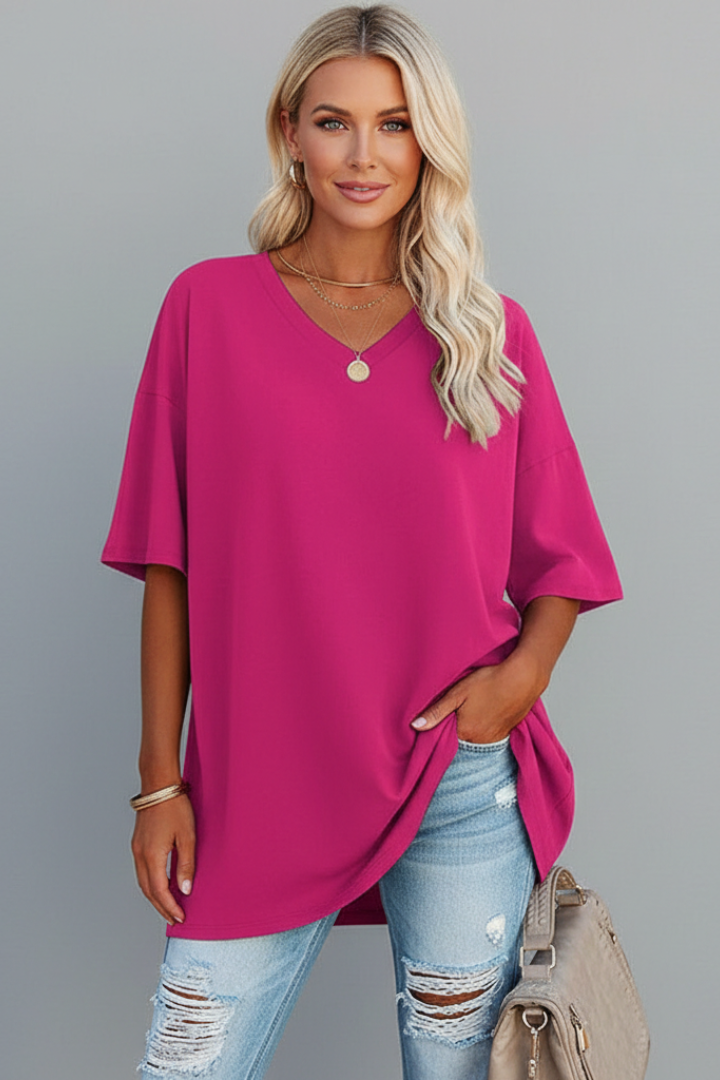 Versatile women's V-neck tee, a white loose fit short sleeve top for casual wear.