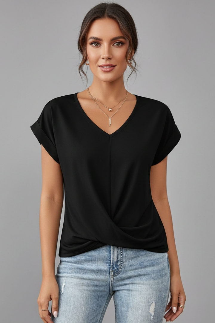Soft pink women's loose V-neck t-shirt, perfect for comfortable daily wear.