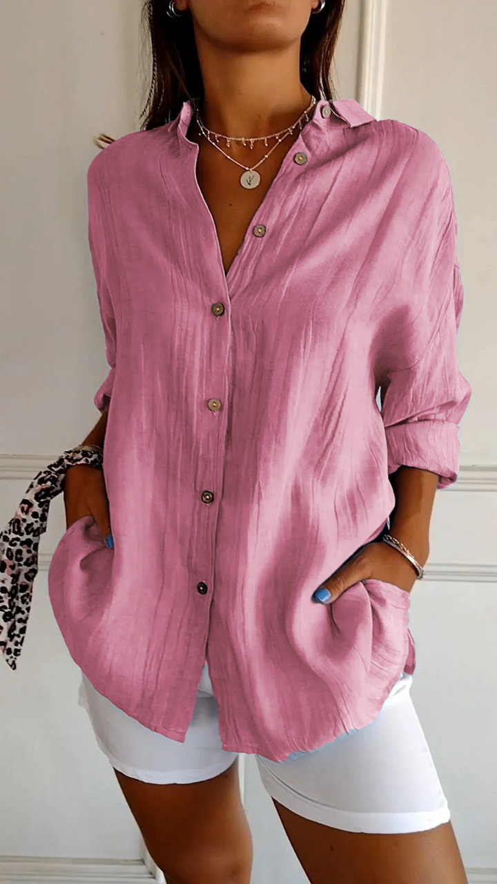 Classic striped oversized women's shirt. Button-down, collared, long sleeve for effortless casual wear & layering.