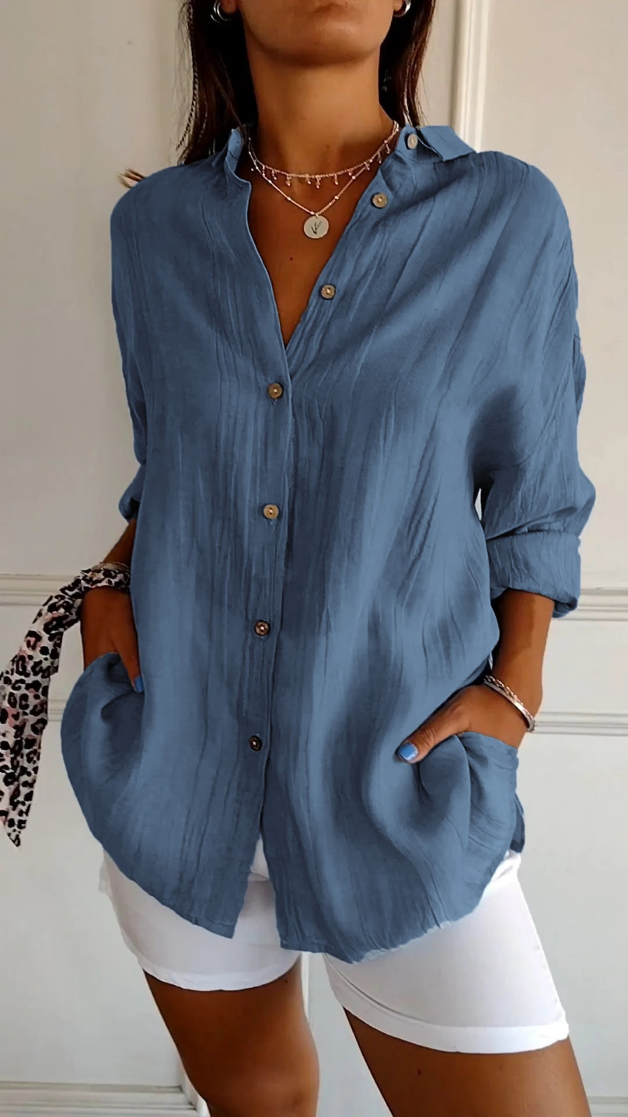 Everyday style women's oversized collared shirt. Long sleeve button-down for a relaxed fit, perfect for casual wear.