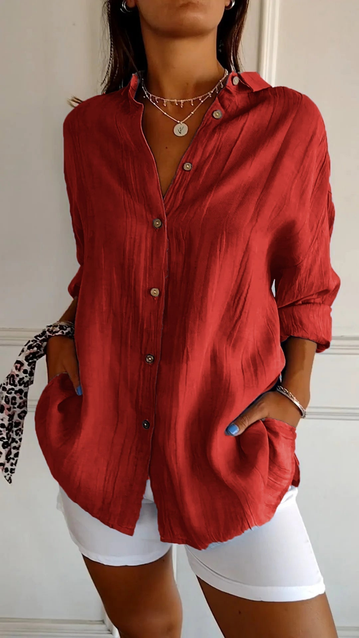 Chic oversized long sleeve button-down collared shirt for women. Relaxed fit, ideal for casual and everyday style.