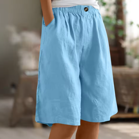 Khaki wide leg Bermuda shorts for women, comfortable & stylish with pockets, perfect for summer vacation.