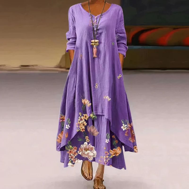 Women's boho maxi dress with long sleeves, layered hem, asymmetrical cut, and relaxed fit; ideal for spring outings.