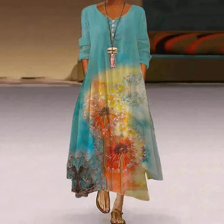 Women's boho maxi dress with long sleeves, layered hem, asymmetrical cut, and relaxed fit; ideal for spring outings.