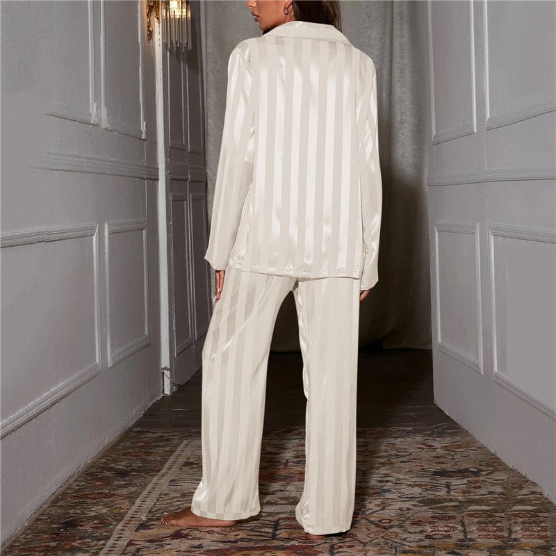 Women's classic striped pajama set with buttoned top and elastic waist pants in breathable fabric for comfort and style.