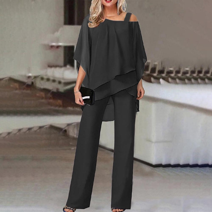 "Women's elegant cold-shoulder jumpsuit, wide-leg pants, front view; modern style, versatile for events."