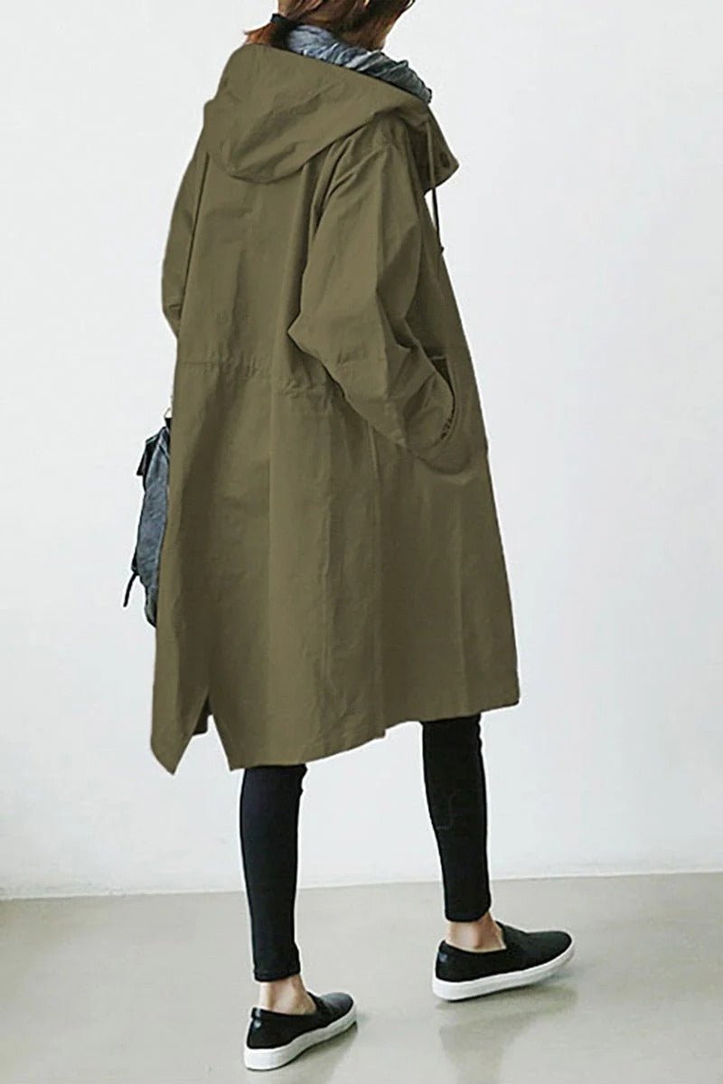 Women's hooded waterproof trench coat, front view. Adjustable hood, belted waist, available in various colors.
