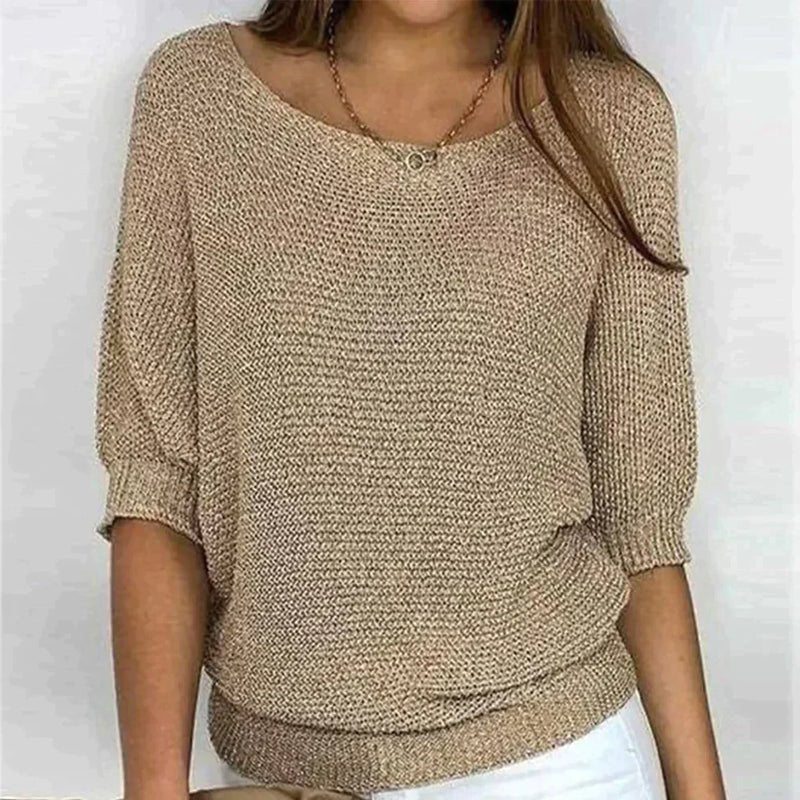 Women's loose knit pullover with half sleeves, wide neckline, textured knit, relaxed fit, ideal for casual elegance.