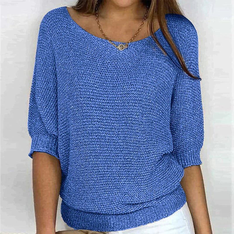 Women's loose knit pullover with half sleeves, wide neckline, textured knit, relaxed fit, ideal for casual elegance.