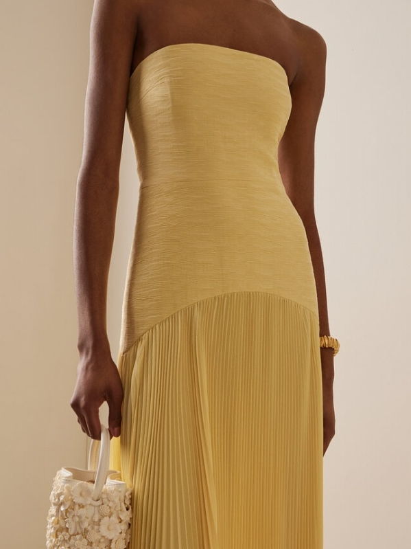 "Women's strapless pleated maxi dress in green and yellow, front view; elegant evening wear with a pleated skirt."
